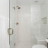 Guest bathroom shower with white subway tile